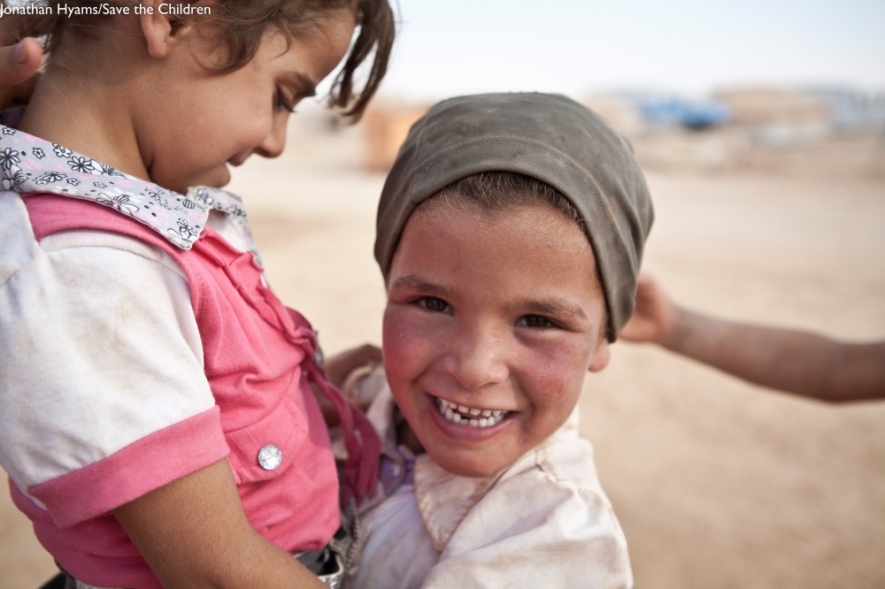 Syrian girls play together at Za'atari Refugee Camp, Jordan